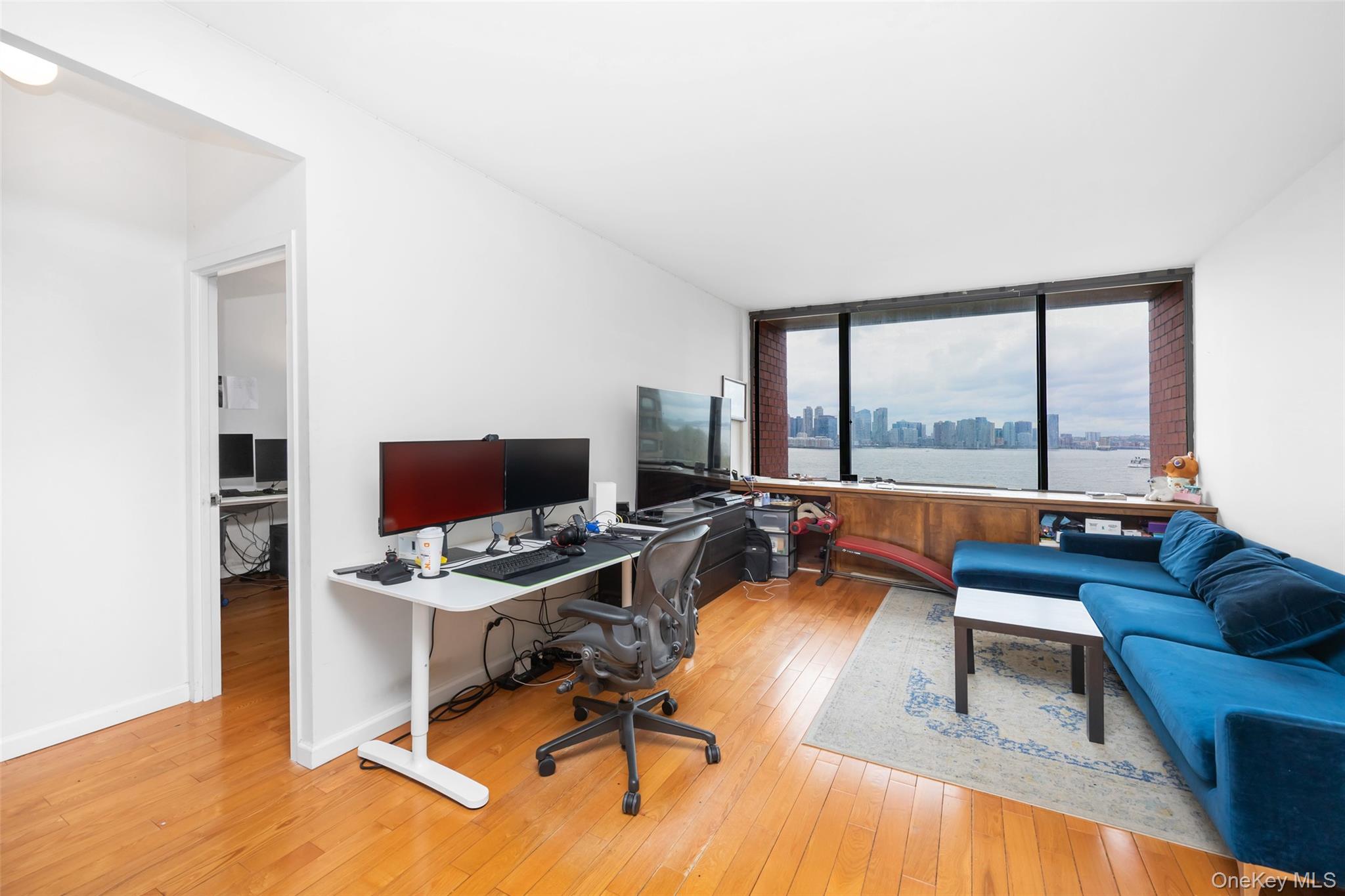 380 Rector Place, Unit 7A Manhattan, NY 10280 - Photo 1 of 19 Office featuring baseboards and hardwood / wood-style floors