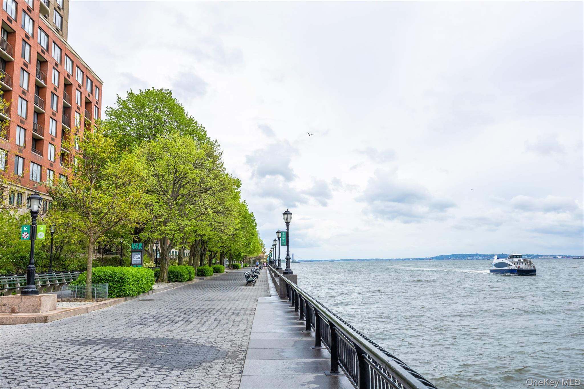 380 Rector Place, Unit 7A Manhattan, NY 10280 - Photo 15 of 19 Dock area featuring a water view