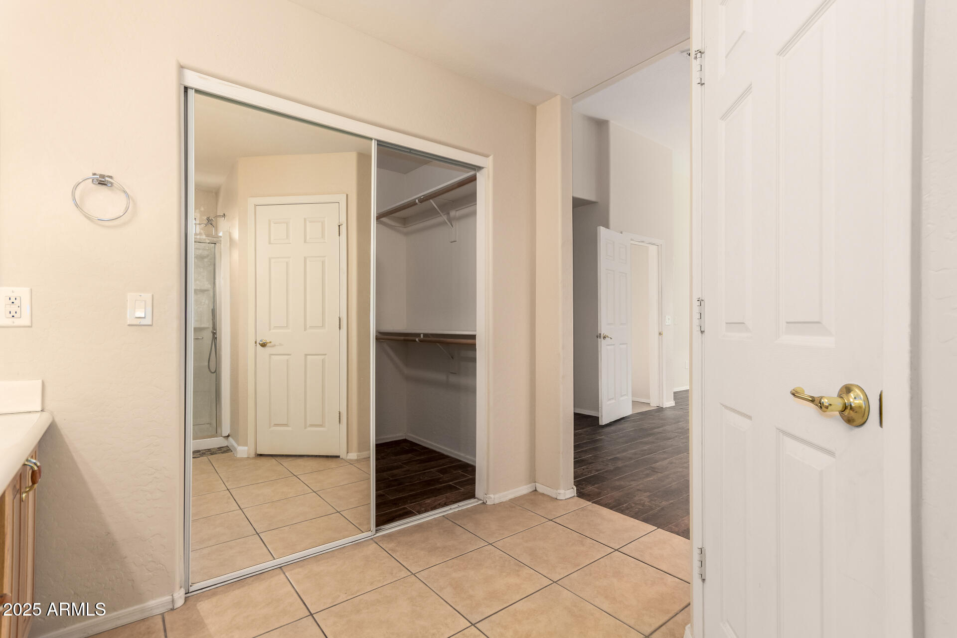 2513 West Carter Road Phoenix, AZ 85041 - Photo 15 of 27 a bathroom with a shower and a sink