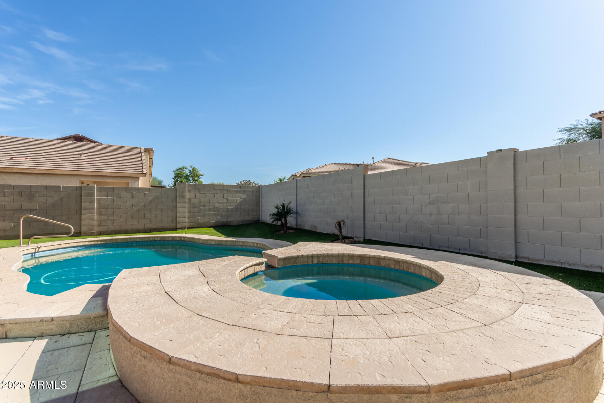 2513 West Carter Road Phoenix, AZ 85041 - Photo 26 of 27 a view of swimming pool with a yard