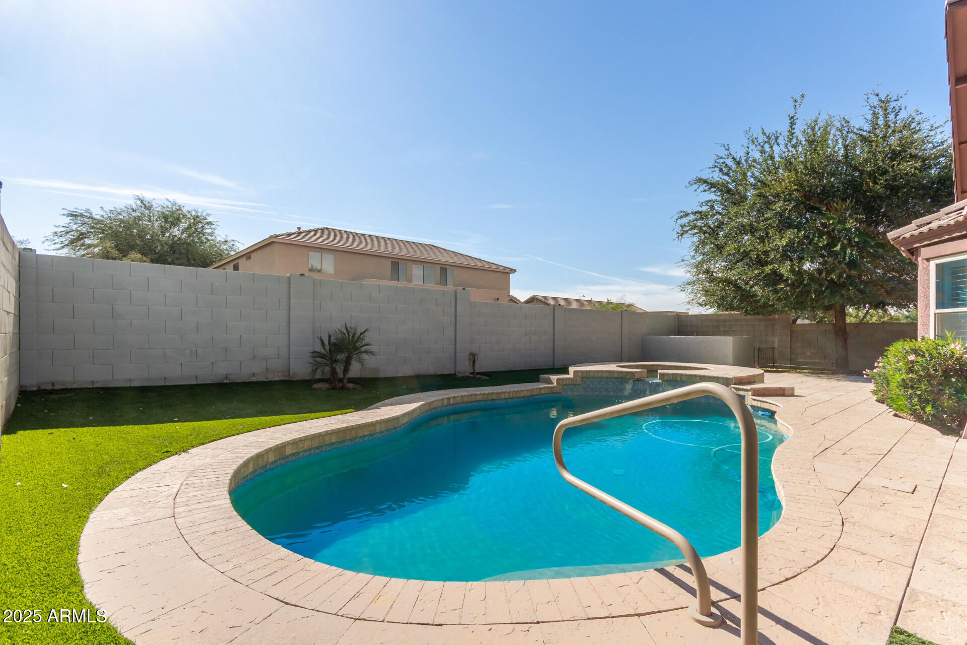 2513 West Carter Road Phoenix, AZ 85041 - Photo 27 of 27 a view of outdoor space and swimming pool