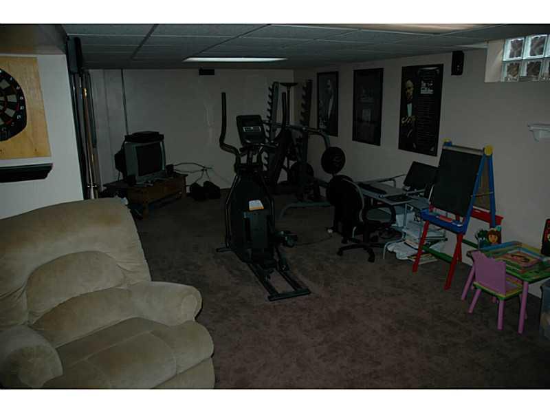 203 Kaufman Road Gibsonia, PA 15044 - Photo 14 of 25 Family Room. One of two family rooms in the Lower level with a full bathroom