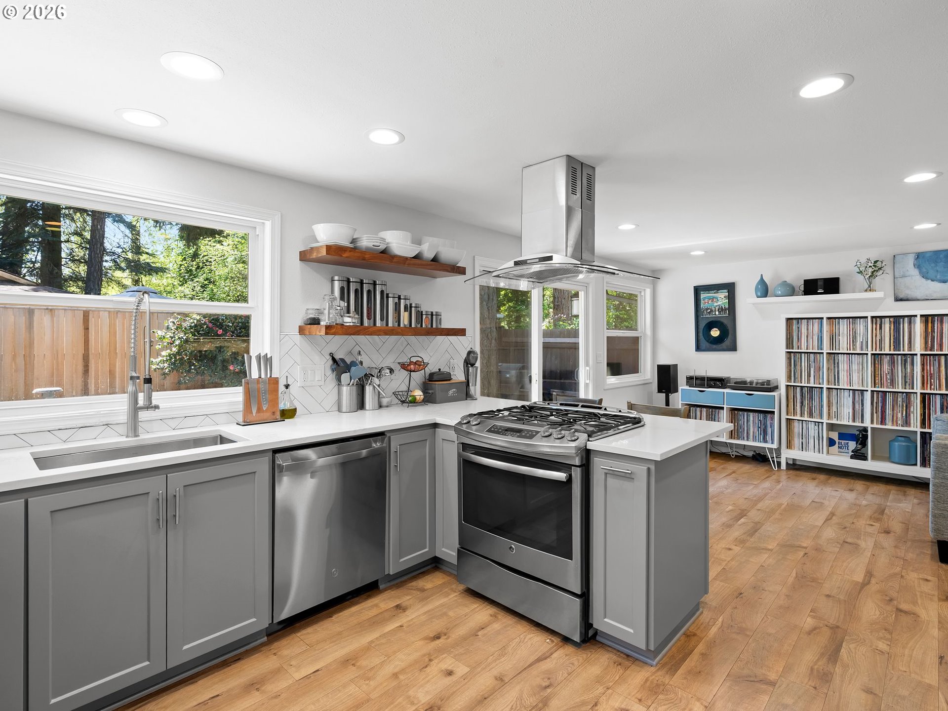 2615 Southwest 175th Avenue Beaverton, OR 97003 - Photo 15 of 42 a kitchen with stainless steel appliances granite countertop a stove and a sink