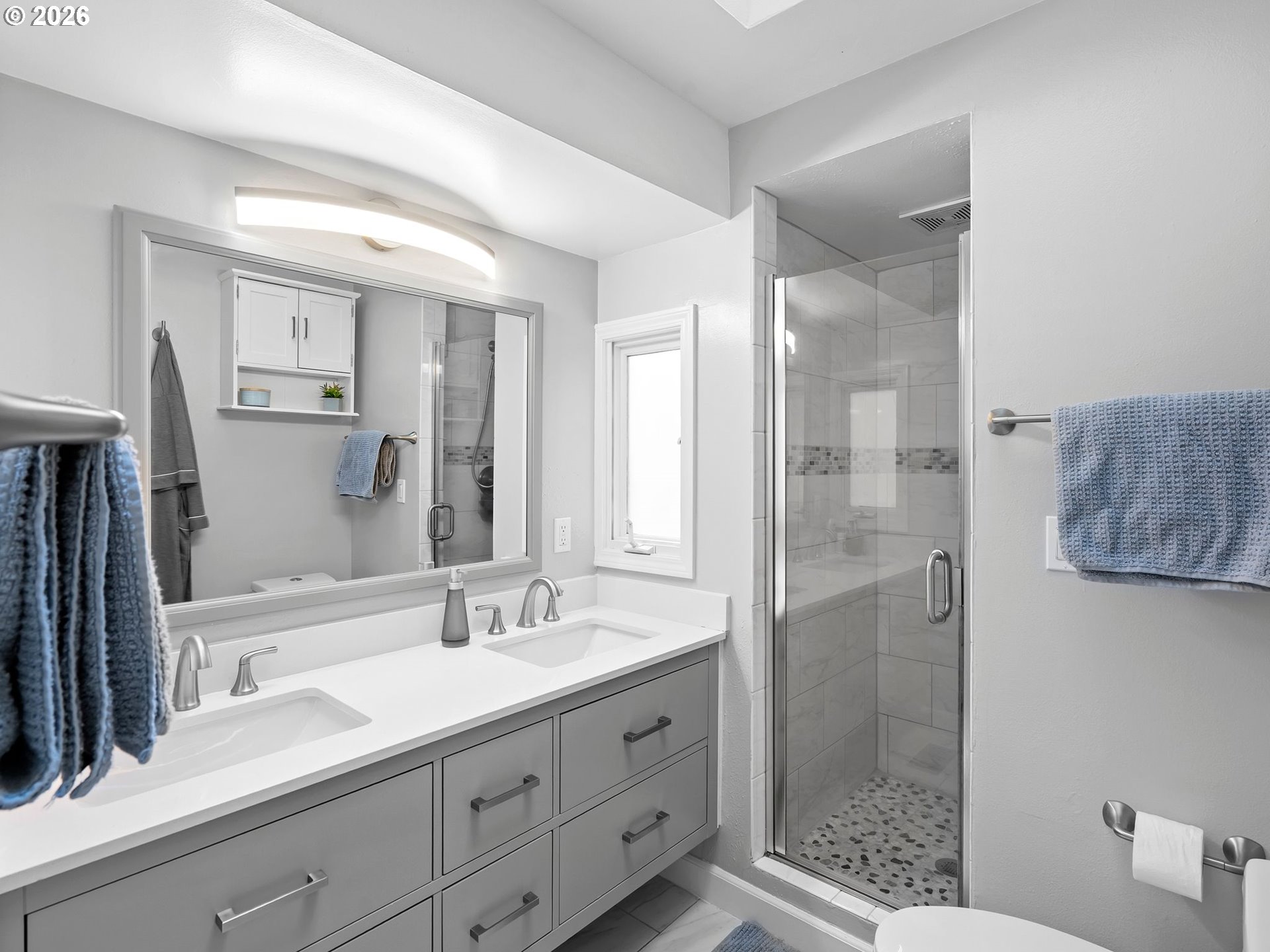 2615 Southwest 175th Avenue Beaverton, OR 97003 - Photo 22 of 42 a bathroom with double vanity sink and a mirror
