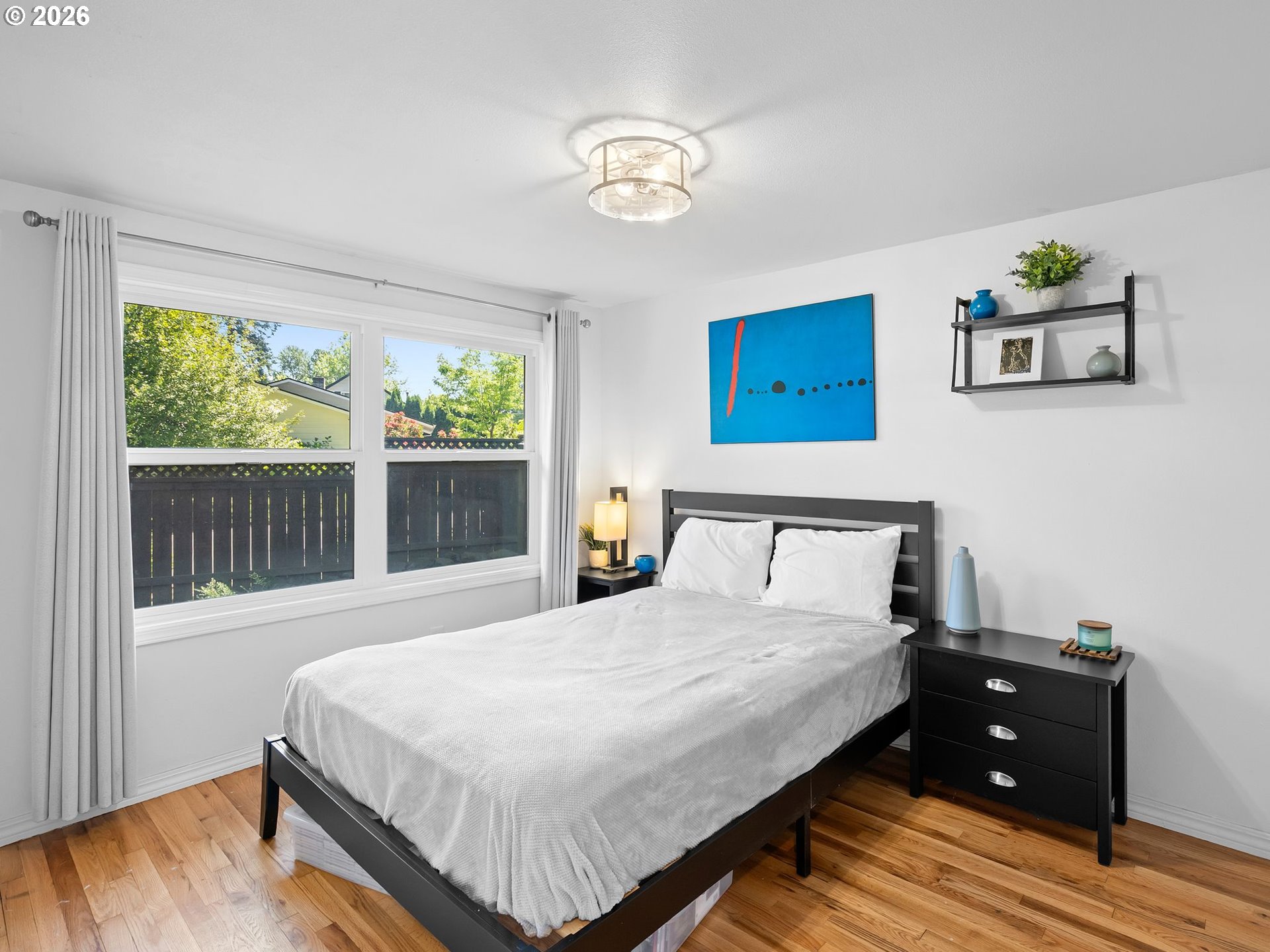 2615 Southwest 175th Avenue Beaverton, OR 97003 - Photo 23 of 42 a bedroom with a bed and a window