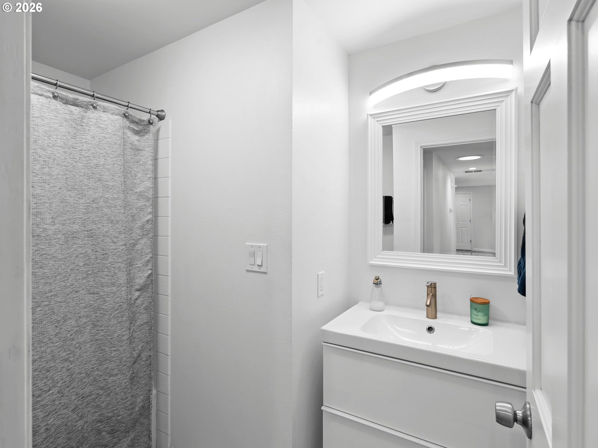 2615 Southwest 175th Avenue Beaverton, OR 97003 - Photo 26 of 42 a bathroom with a sink vanity and mirror