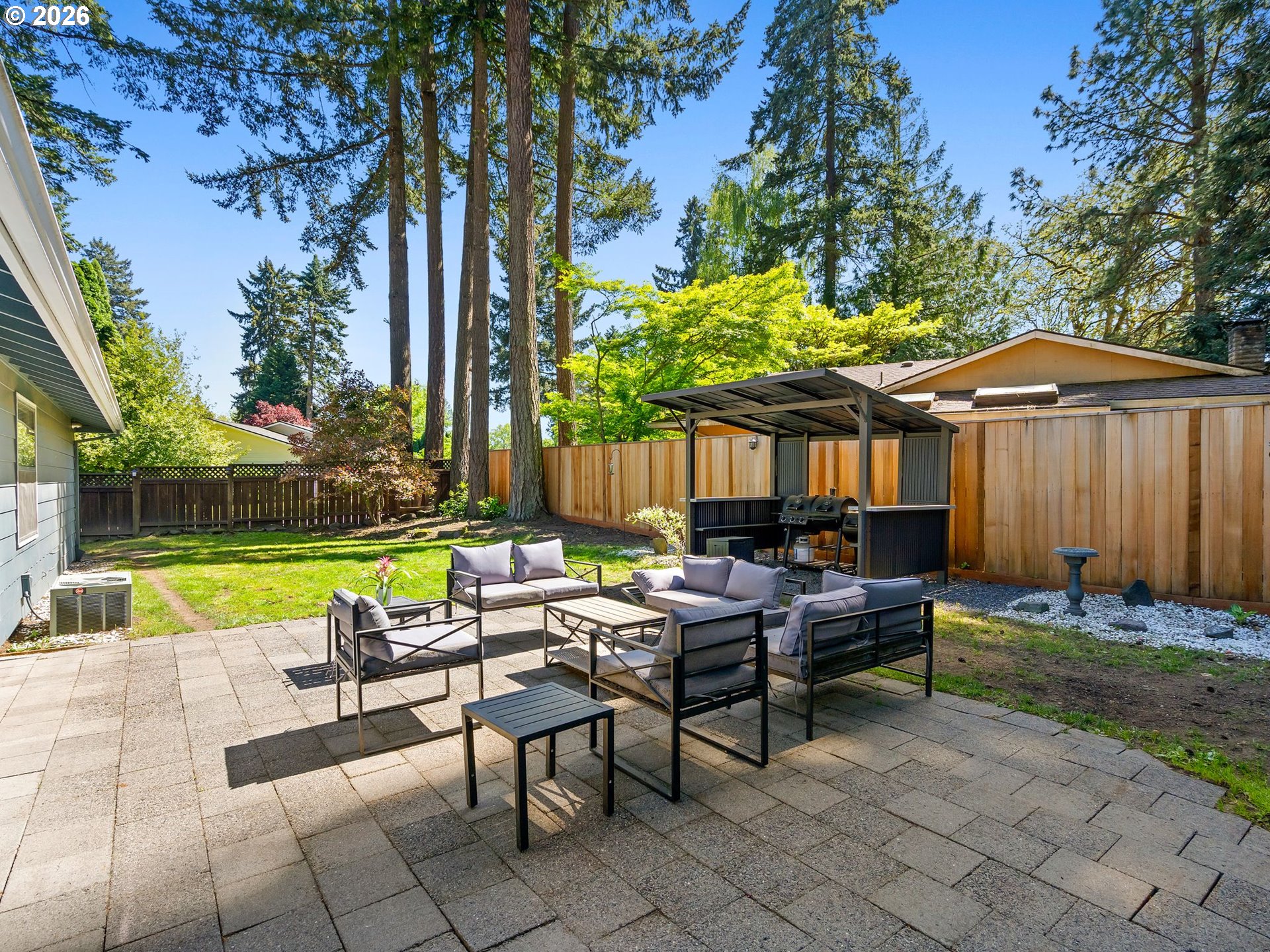 2615 Southwest 175th Avenue Beaverton, OR 97003 - Photo 30 of 42 a view of a house with backyard and sitting area