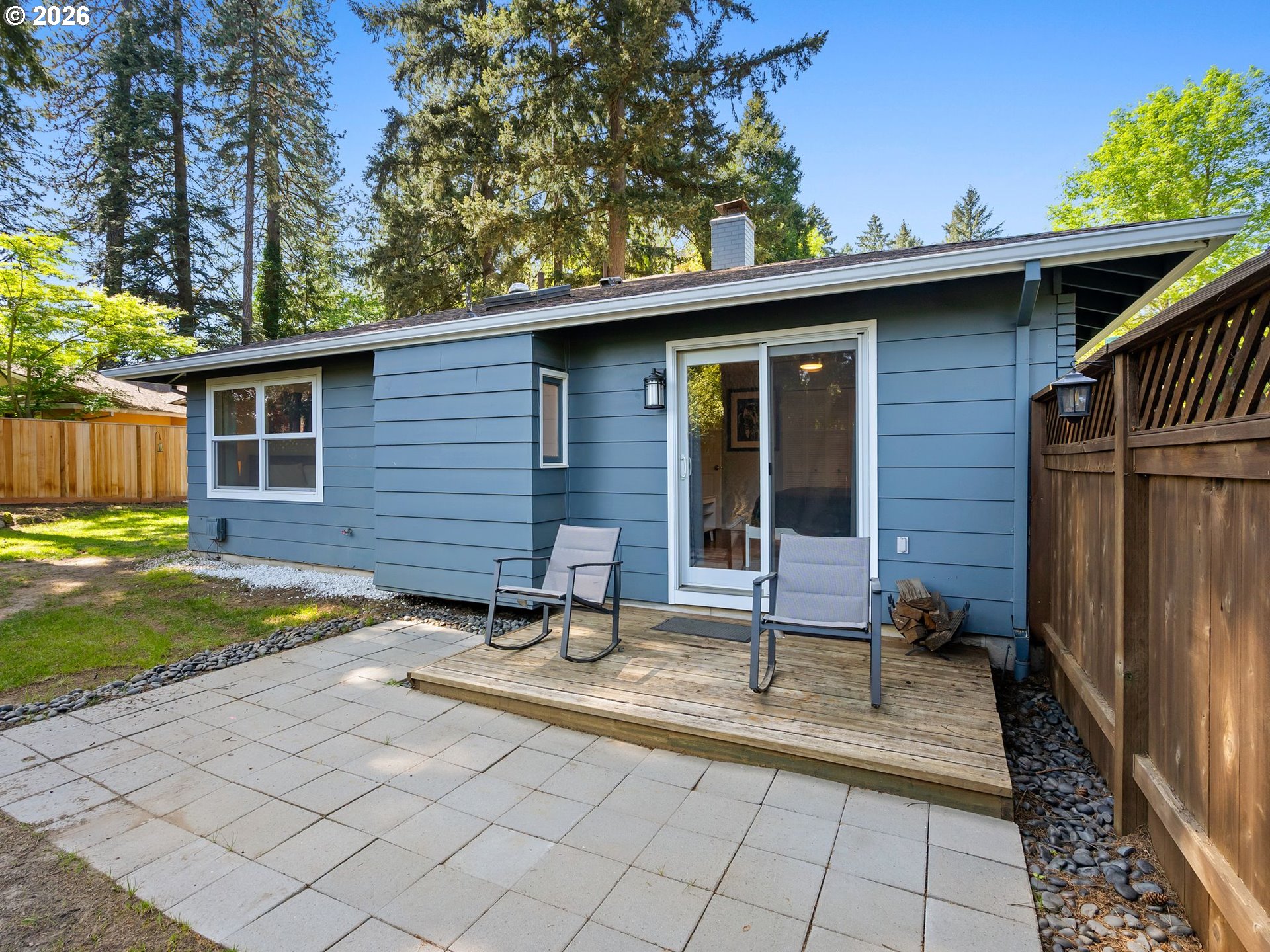 2615 Southwest 175th Avenue Beaverton, OR 97003 - Photo 36 of 42 a view of a chair and table in backyard of the house