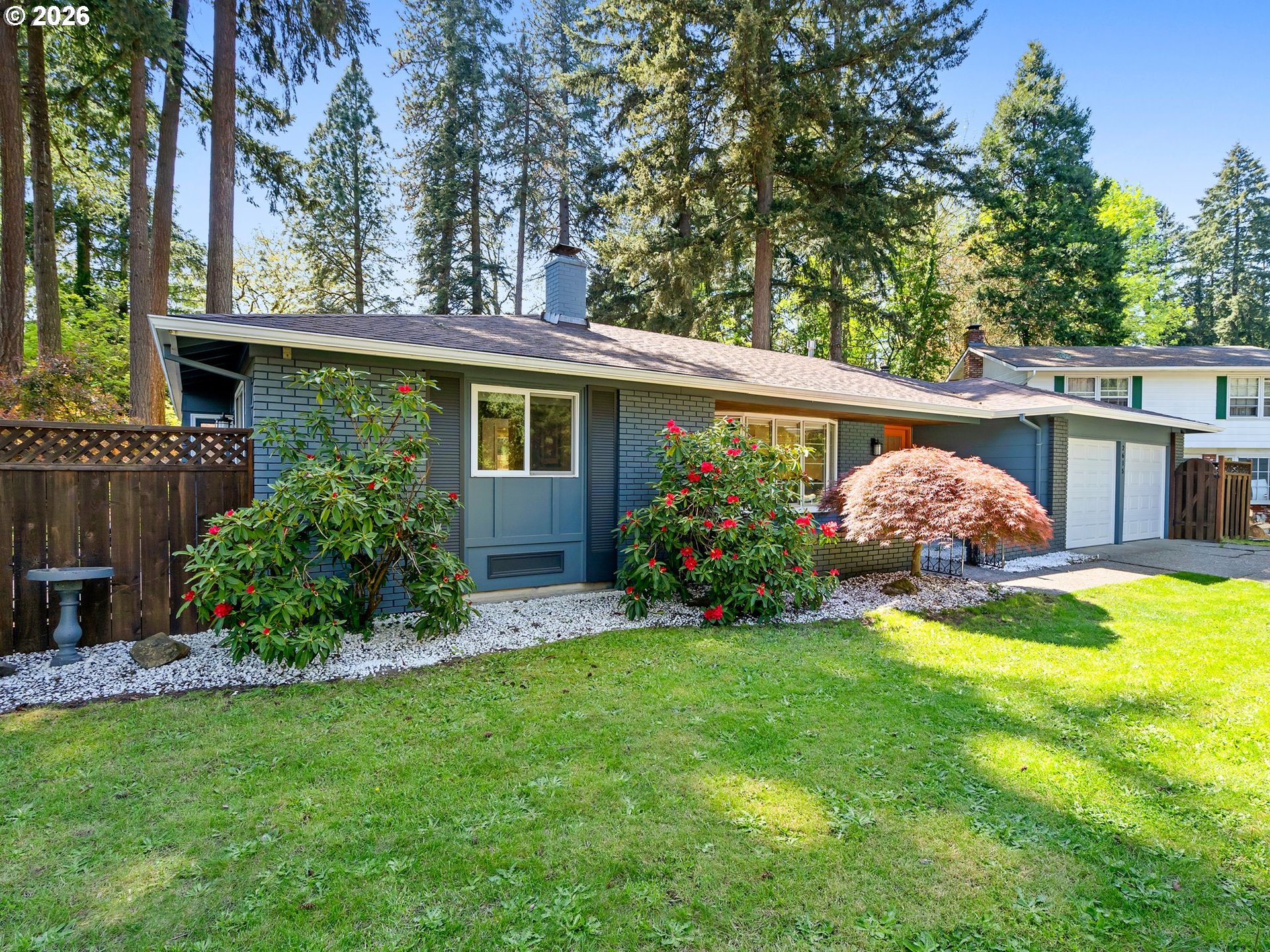 2615 Southwest 175th Avenue Beaverton, OR 97003 - Photo 40 of 42 a view of a backyard with garden and plants