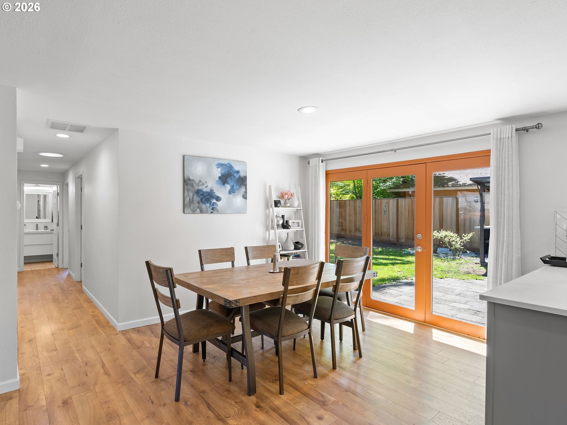 2615 Southwest 175th Avenue Beaverton, OR 97003 - Photo 8 of 42 a view of a dining room with furniture and wooden floor