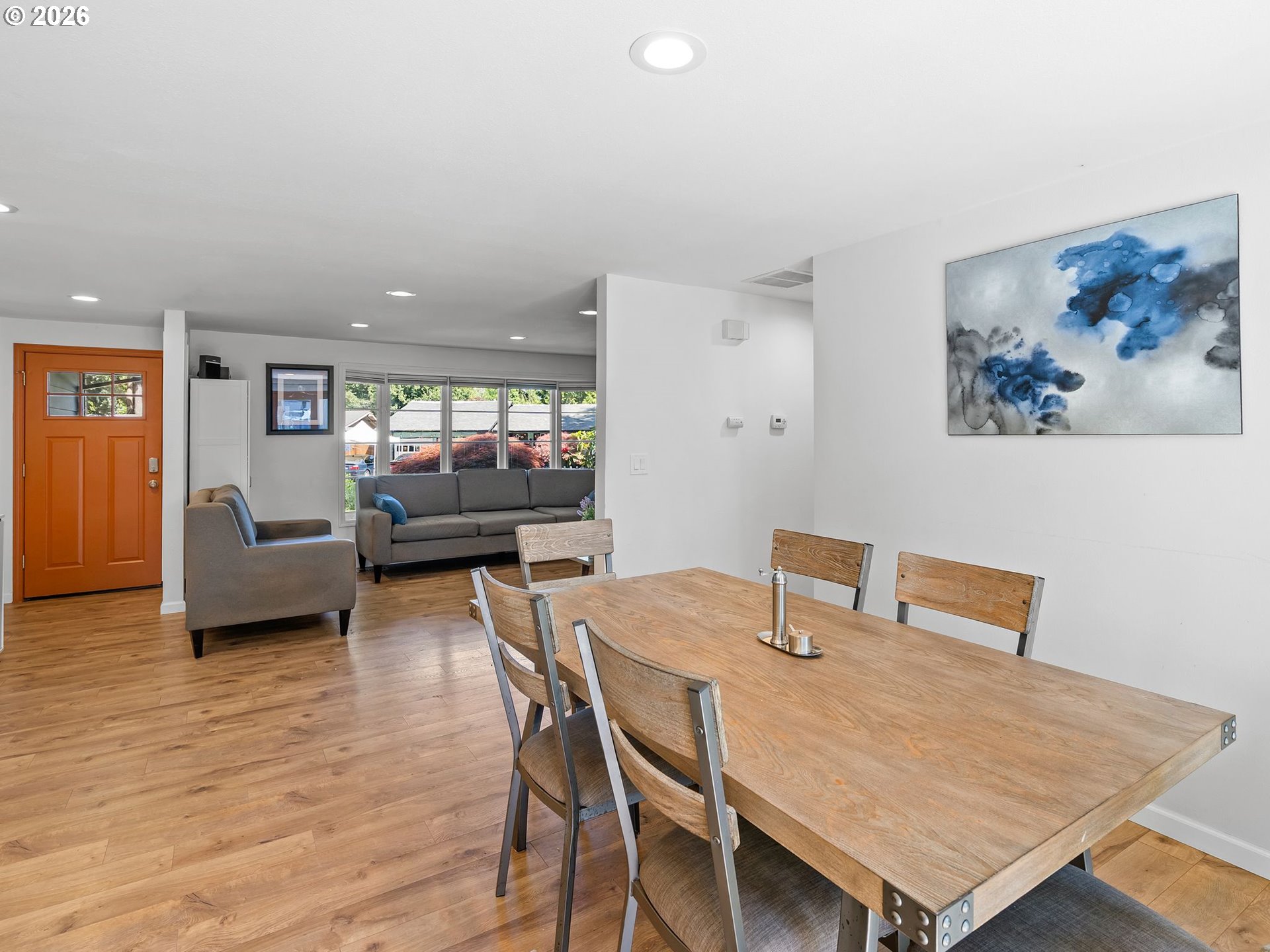 2615 Southwest 175th Avenue Beaverton, OR 97003 - Photo 9 of 42 a view of a dining room with furniture and wooden floor