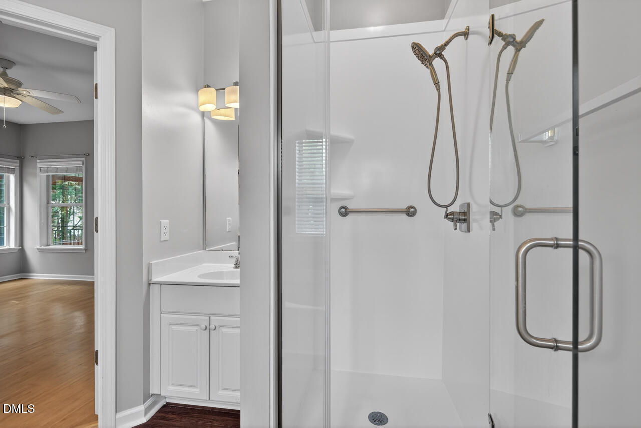 5325 Bartram Place Raleigh, NC 27617 - Photo 20 of 31 a bathroom with a shower