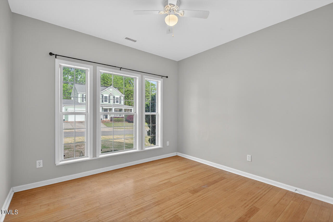 5325 Bartram Place Raleigh, NC 27617 - Photo 22 of 31 a view of an empty room with a window