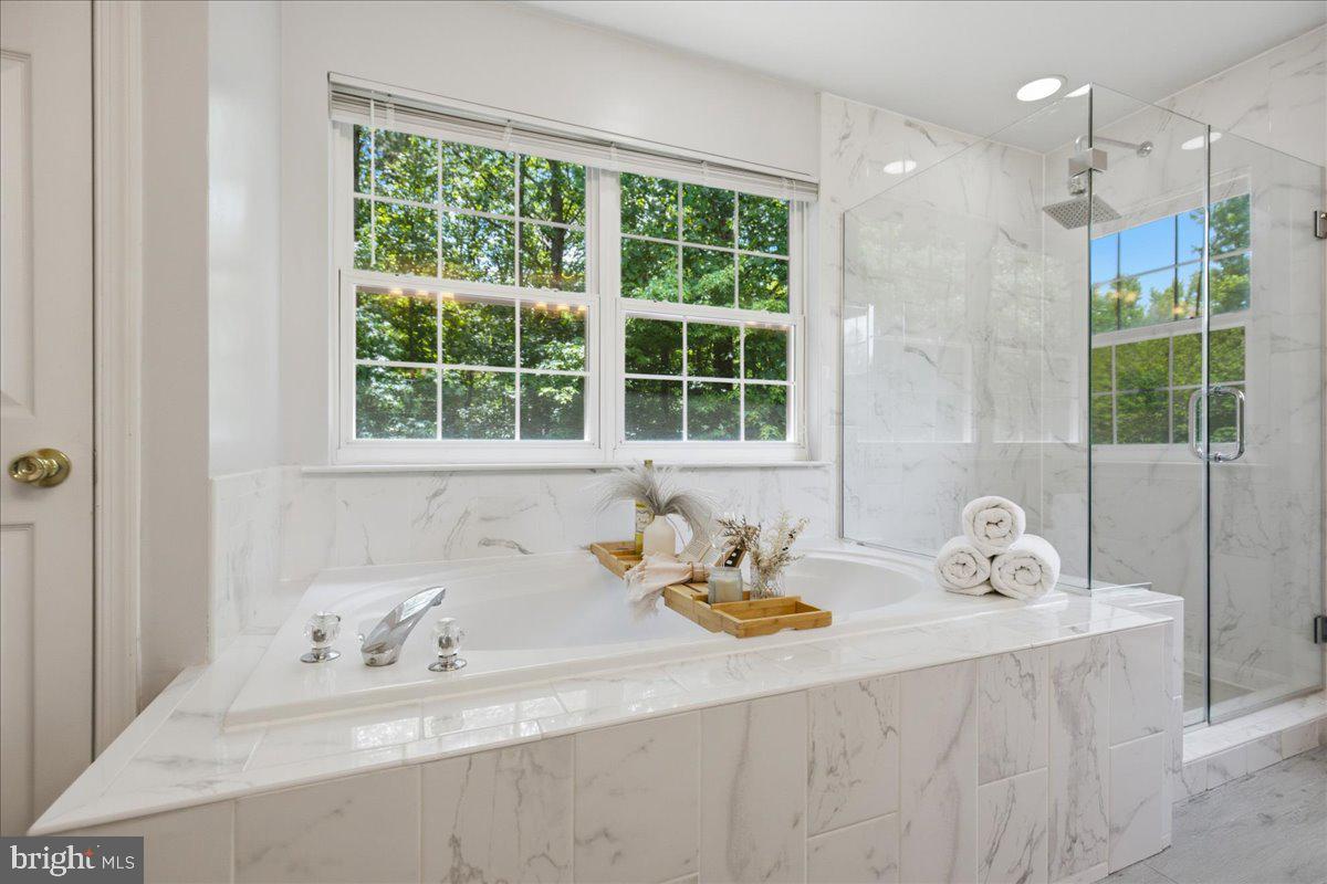 2424 Springbrook Court Huntingtown, MD 20639 - Photo 55 of 103 a bathroom with a sink and a window