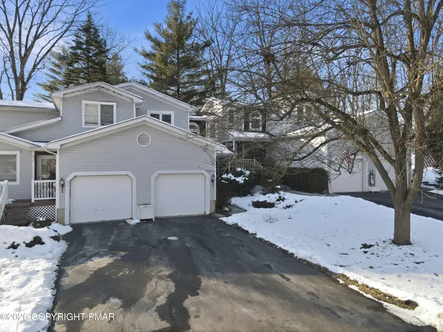 a view of a backyard of the house