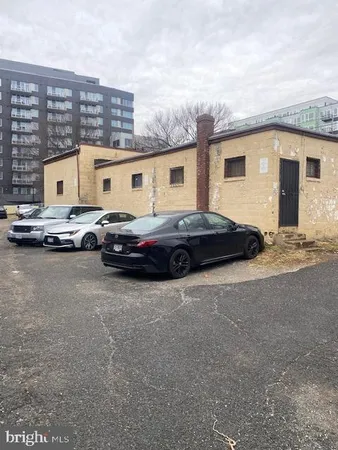 a car parked in front of a house