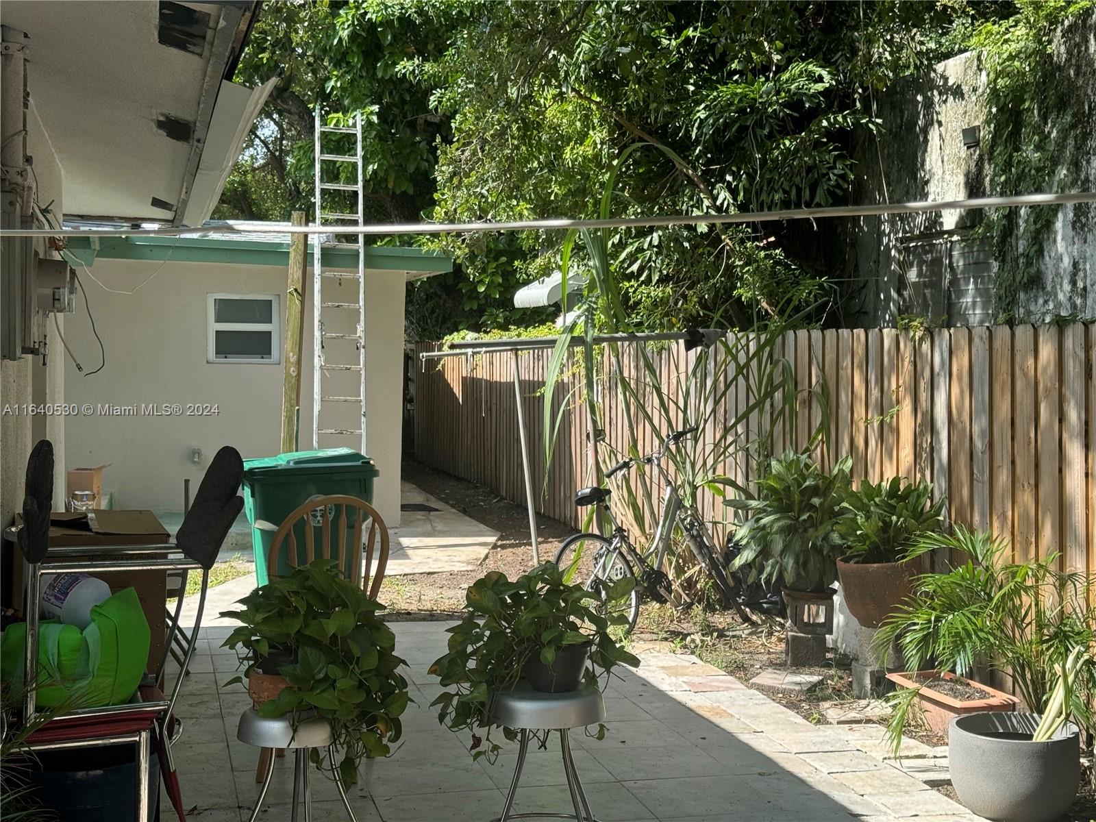 655 Northeast 80th Street Miami, FL 33138 - Photo 19 of 19 a house view with a seating space