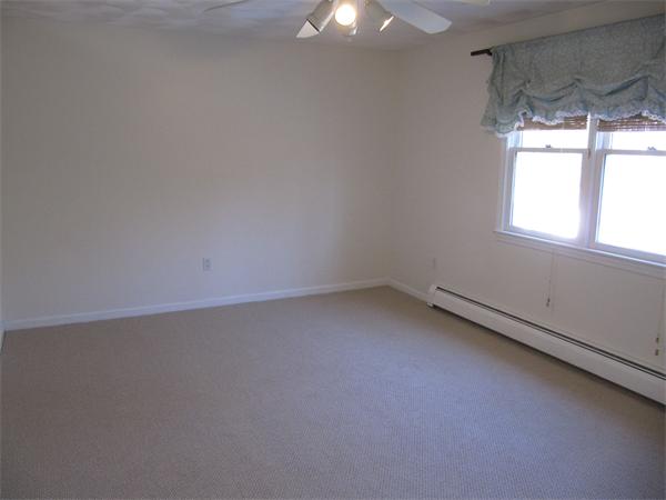 202 Warren Road Townsend, MA 01469 - Photo 29 of 30 an empty room with a window