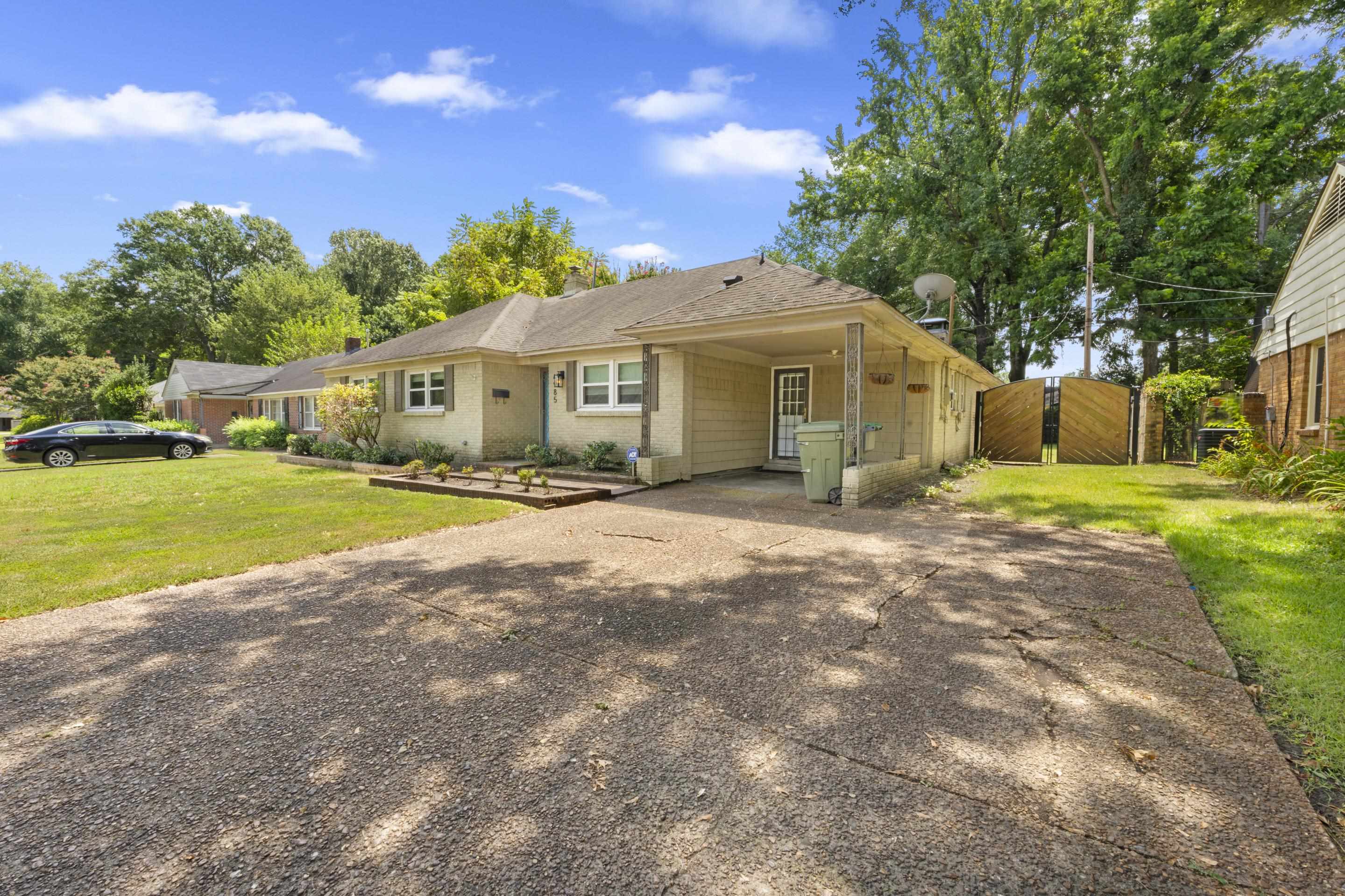 4985 Chickasaw Road Memphis, TN 38117 - Photo 2 of 30 a view of a house with a yard