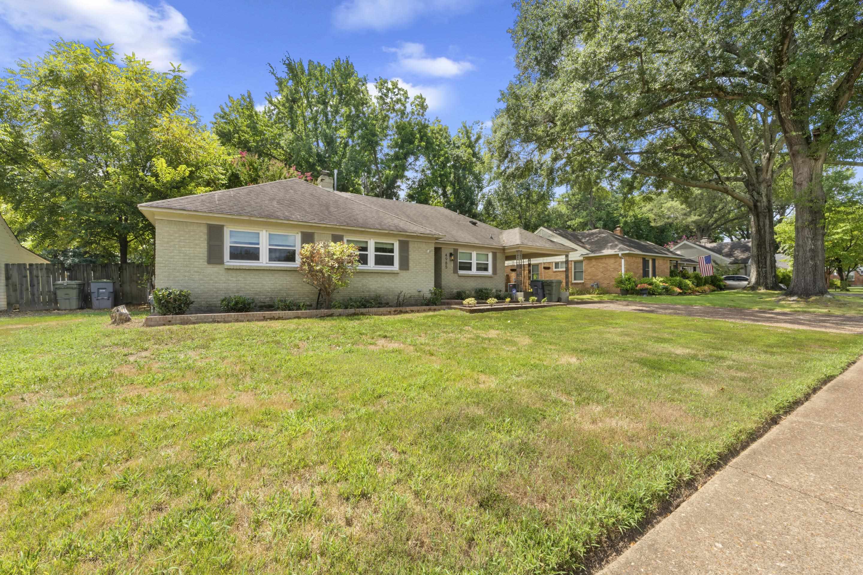 4985 Chickasaw Road Memphis, TN 38117 - Photo 3 of 30 a front view of house with yard and green space