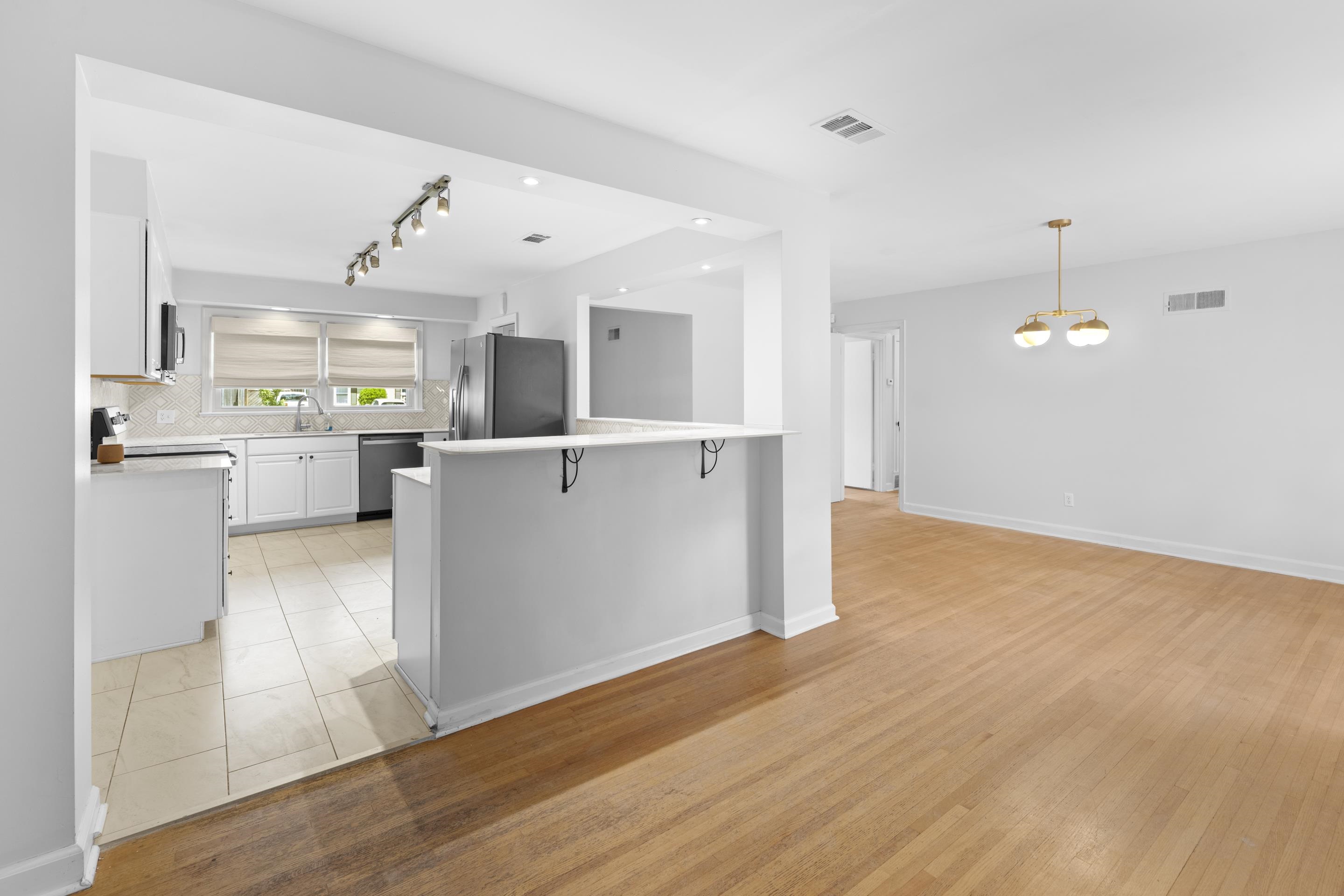 4985 Chickasaw Road Memphis, TN 38117 - Photo 10 of 30 a view of a kitchen and a refrigerator