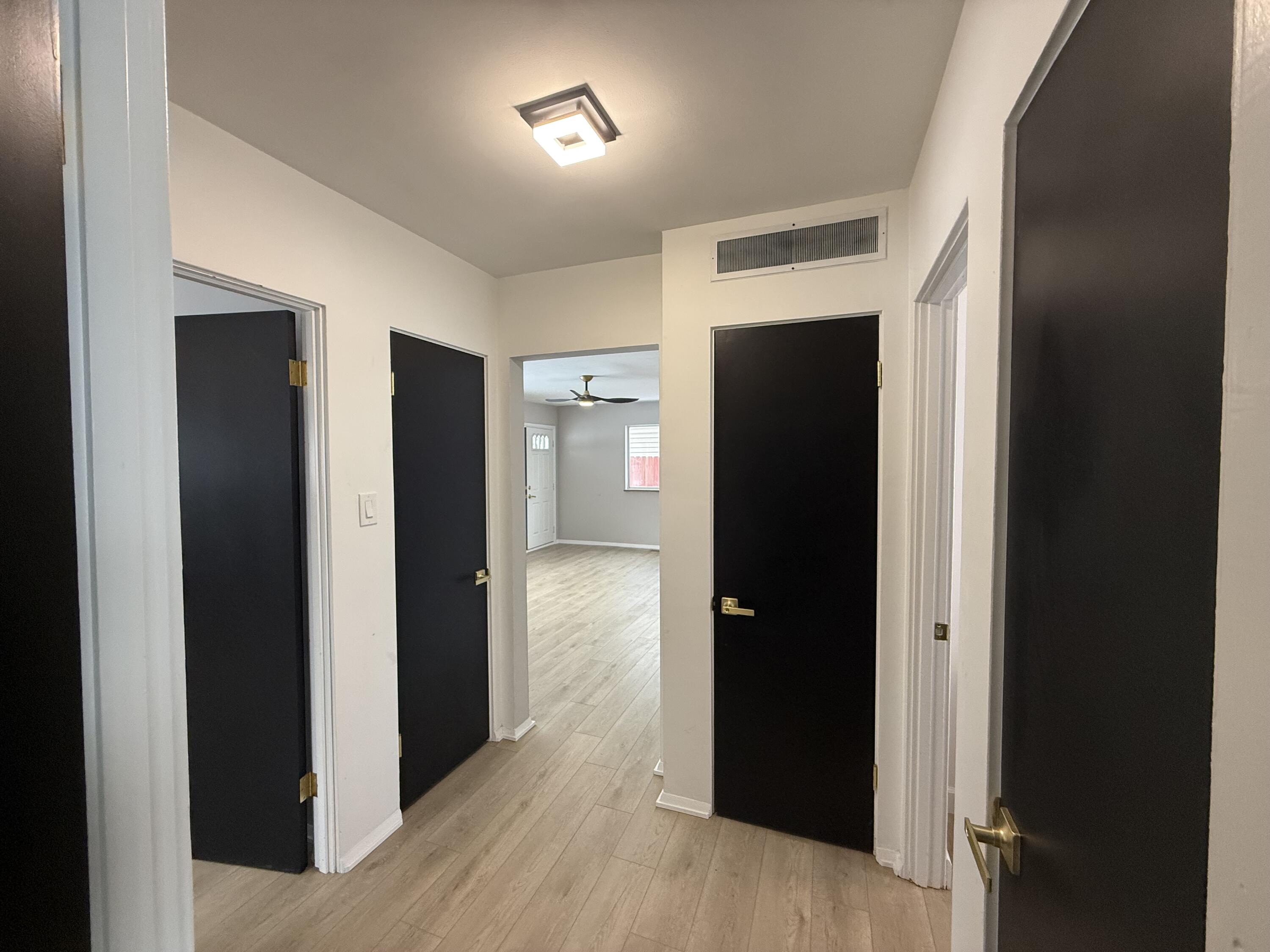 7008 Baring Avenue Hammond, IN 46324 - Photo 12 of 22 a view of hallway with wooden floor