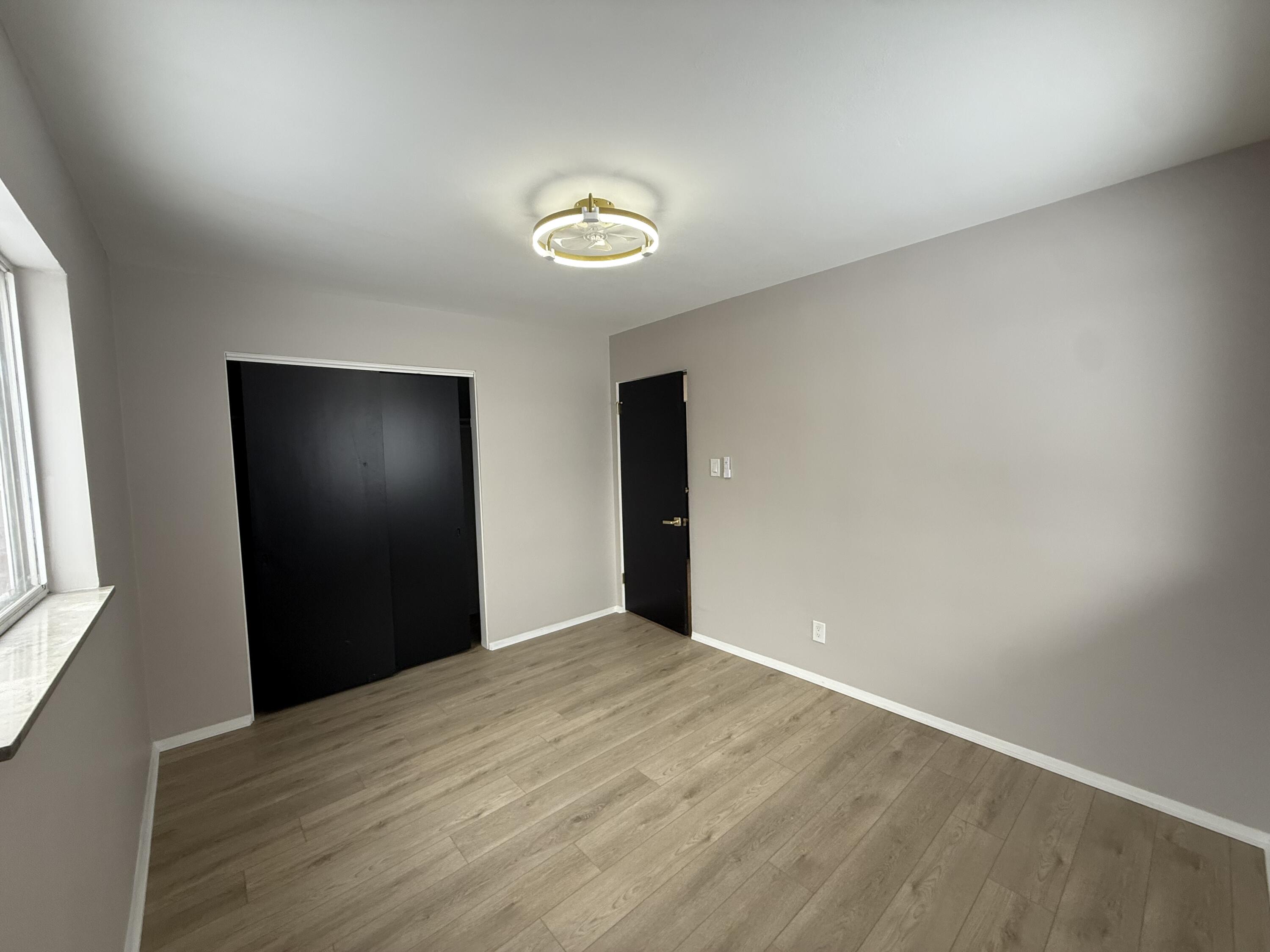 7008 Baring Avenue Hammond, IN 46324 - Photo 13 of 22 a view of an empty room with a window