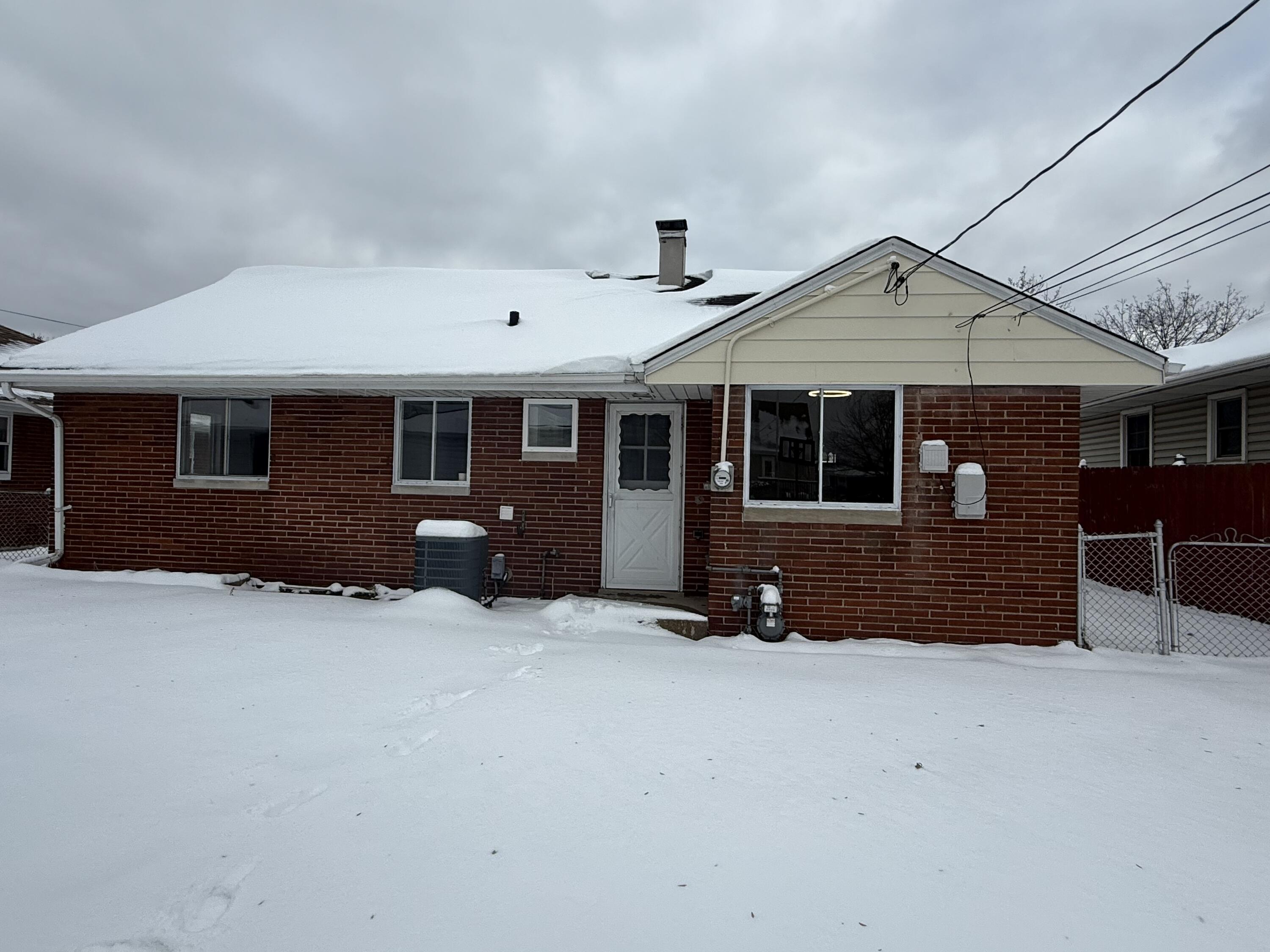 7008 Baring Avenue Hammond, IN 46324 - Photo 21 of 22 a front view of a house with a yard