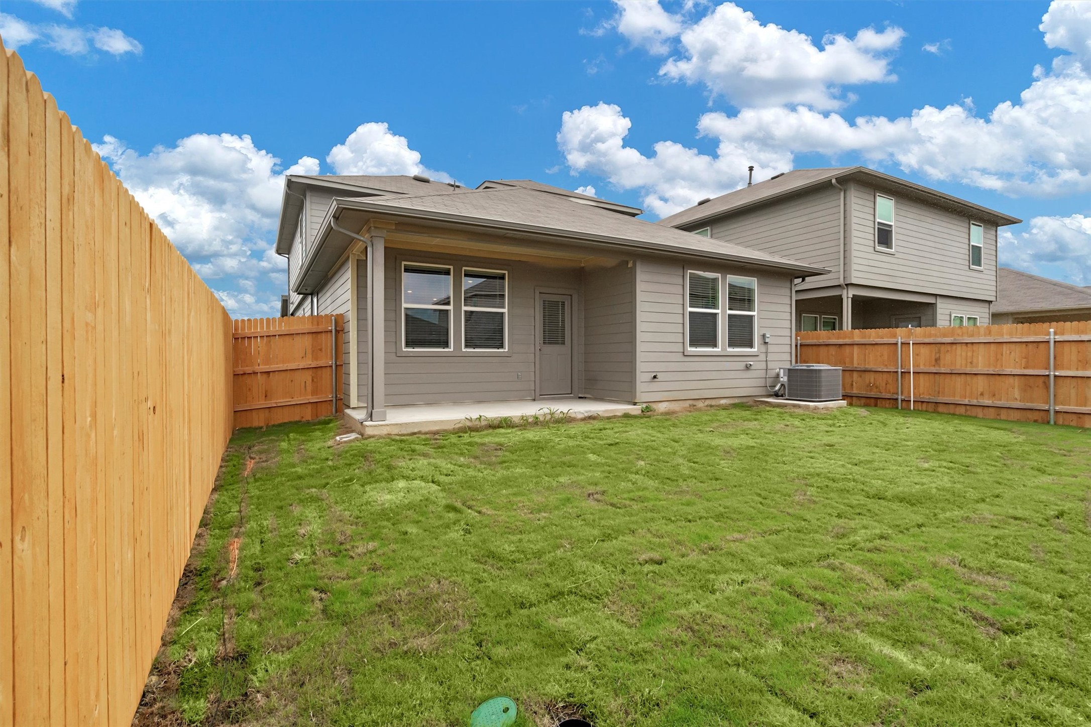 2909 Tweedy Trail Pflugerville, TX 78660 - Photo 23 of 27 A fenced backyard offers a private green space, perfect for outdoor enjoyment.