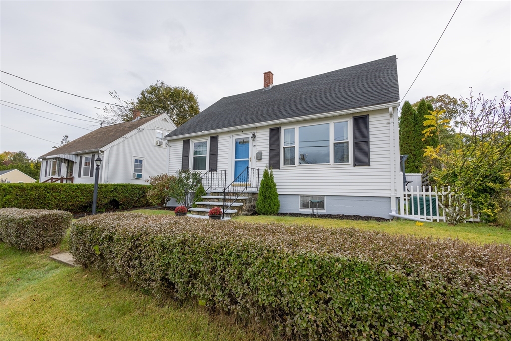 137 Papineau Avenue Woonsocket, RI 02895 - Photo 1 of 33 a view of a house with backyard and sitting area