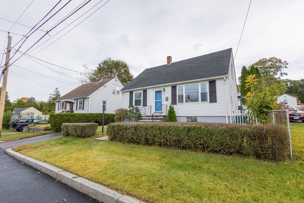 137 Papineau Avenue Woonsocket, RI 02895 - Photo 2 of 33 a front view of a house with garden
