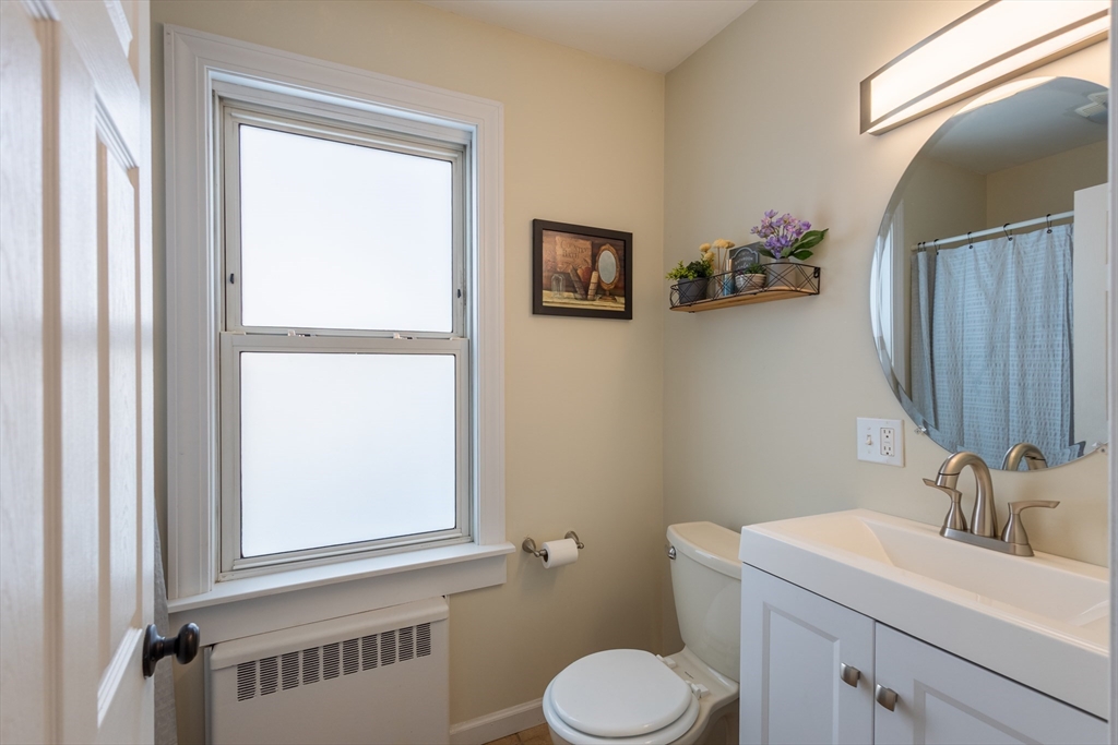 137 Papineau Avenue Woonsocket, RI 02895 - Photo 24 of 33 a bathroom with a sink and a toilet