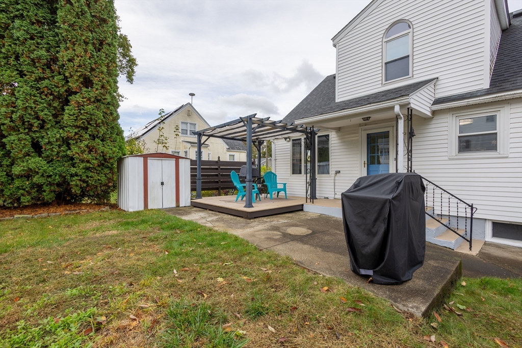 137 Papineau Avenue Woonsocket, RI 02895 - Photo 29 of 33 a view of a house with backyard and sitting area