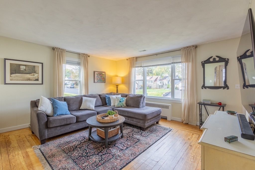 137 Papineau Avenue Woonsocket, RI 02895 - Photo 3 of 33 a living room with furniture and a window