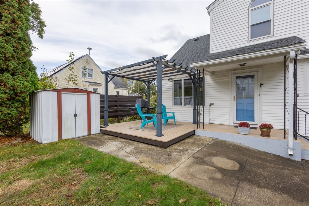 137 Papineau Avenue Woonsocket, RI 02895 - Photo 31 of 33 a front view of a house with garden