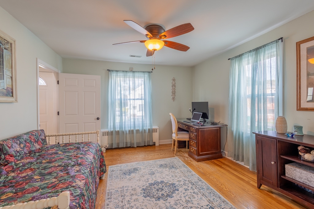 137 Papineau Avenue Woonsocket, RI 02895 - Photo 5 of 33 a bedroom with a bed and a window