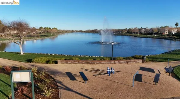 a view of a lake from a balcony