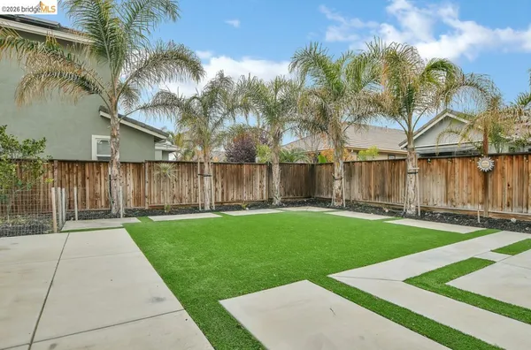 a view of a backyard with a garden