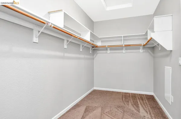 a view of an empty walk in closet