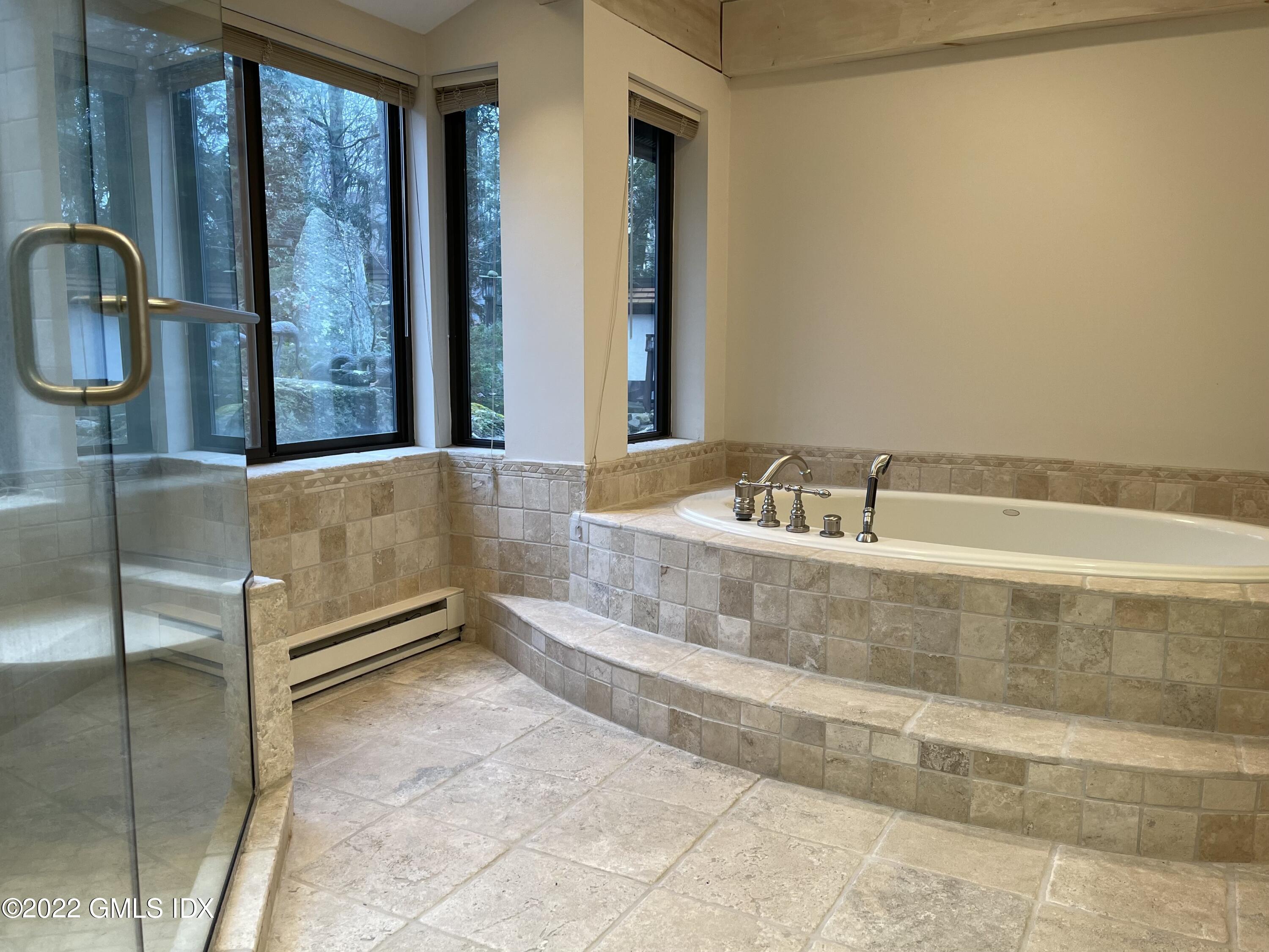 331 Stanwich Road Greenwich, CT 06830 - Photo 13 of 28 a bathroom with sink and mirror