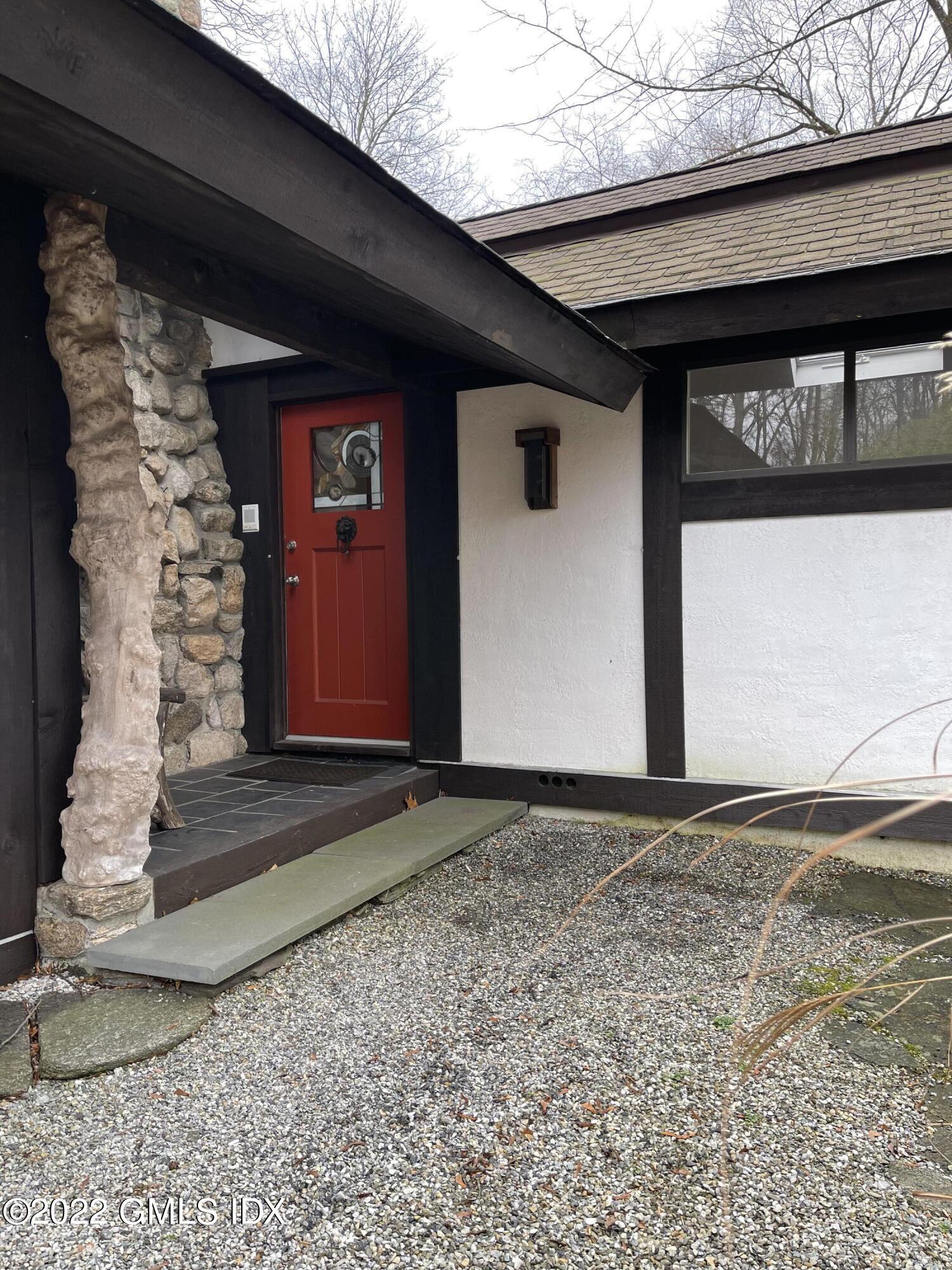 331 Stanwich Road Greenwich, CT 06830 - Photo 2 of 28 a front view of a house