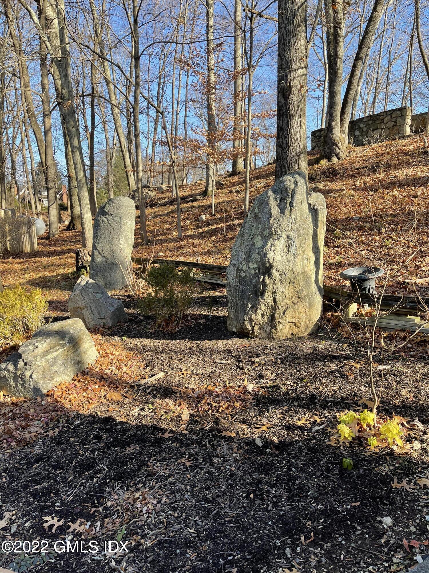 331 Stanwich Road Greenwich, CT 06830 - Photo 28 of 28 a view of a yard with wooden fence
