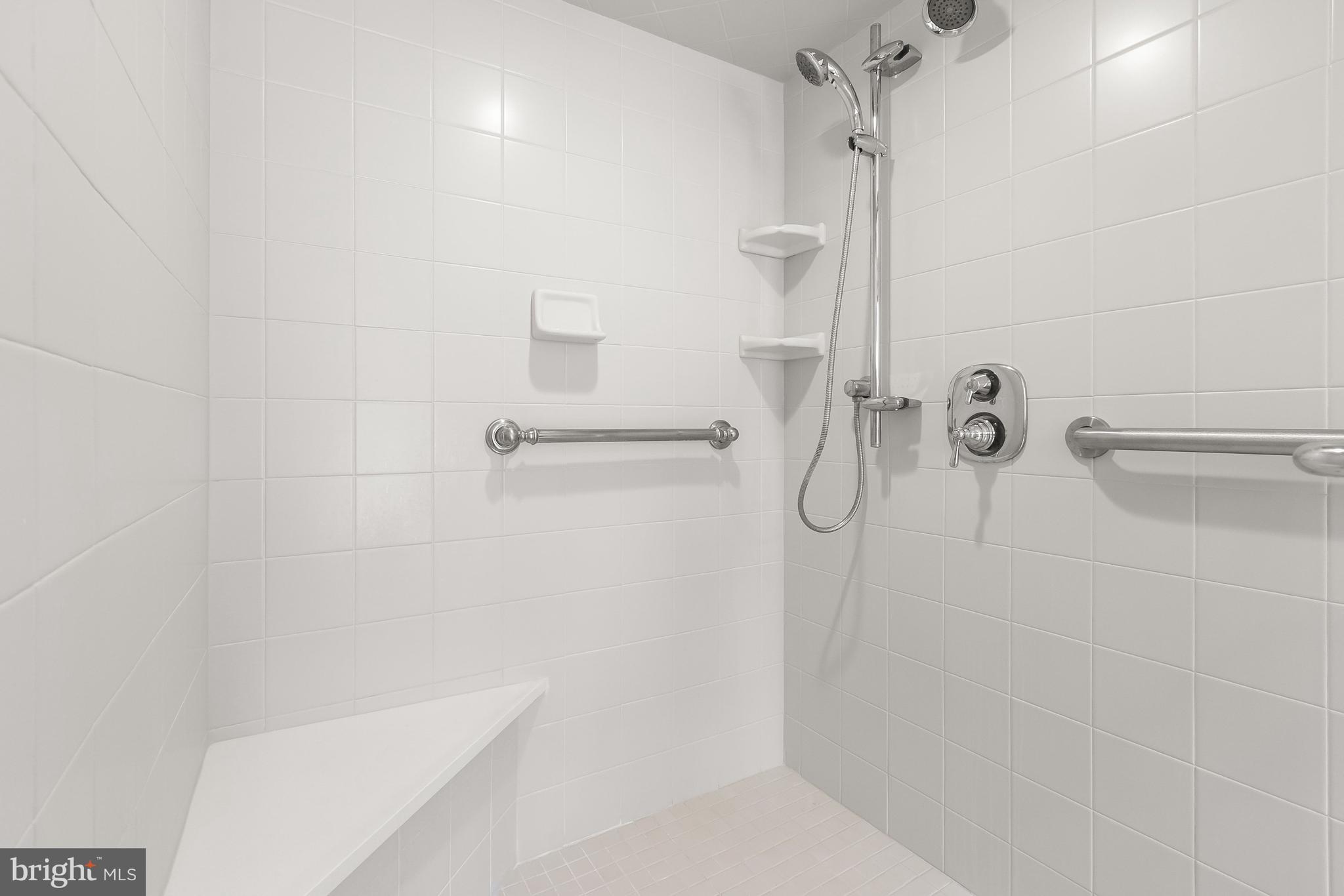 2400 44th Street Northwest Washington, DC 20007 - Photo 46 of 65 Primary Ensuite White Tiled Shower