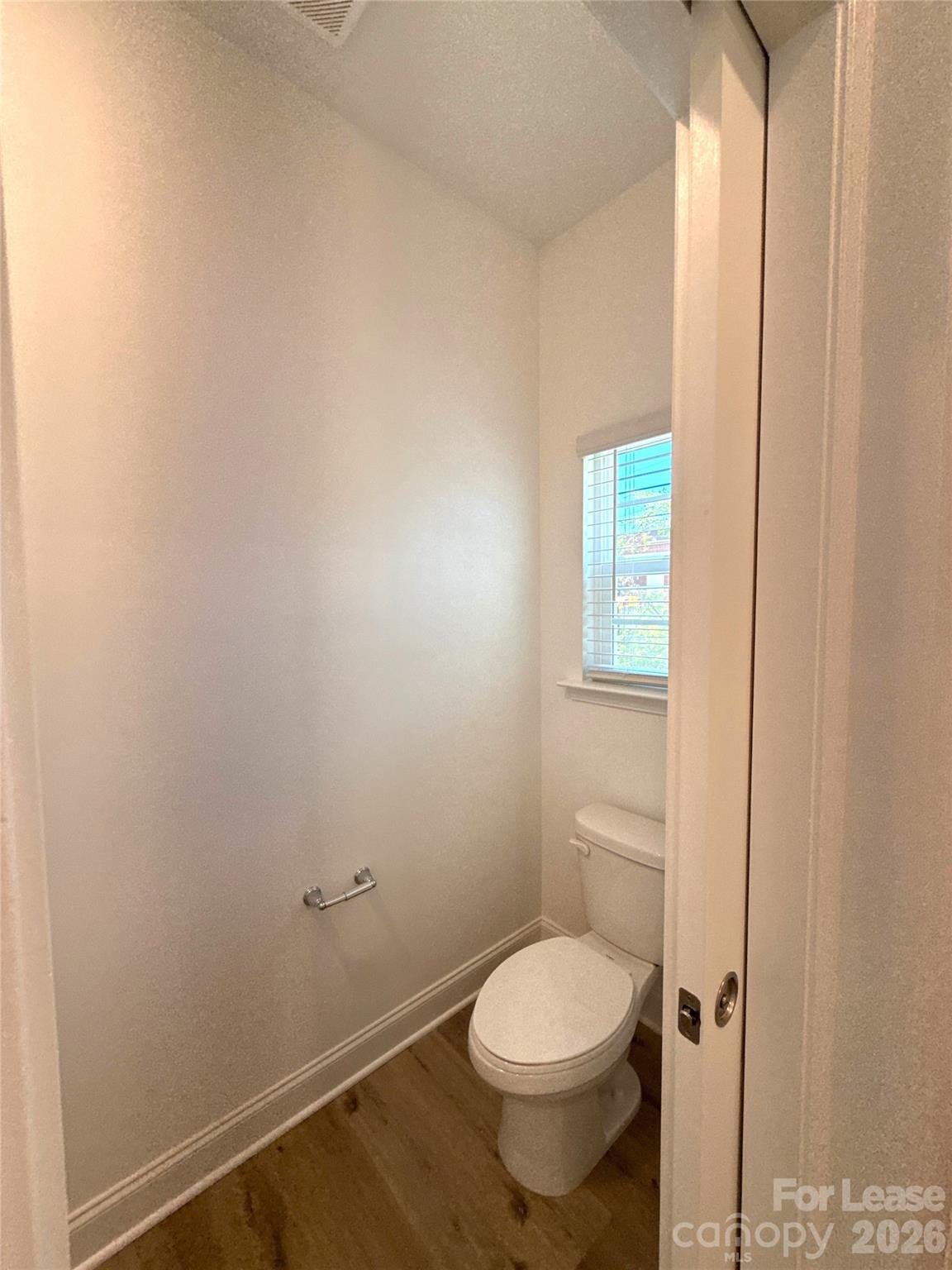 3220 Butler Hl Drive Matthews, NC 28105 - Photo 6 of 11 a bathroom with a toilet