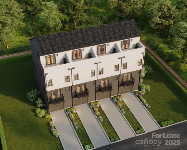 a front view of a building with lot of windows