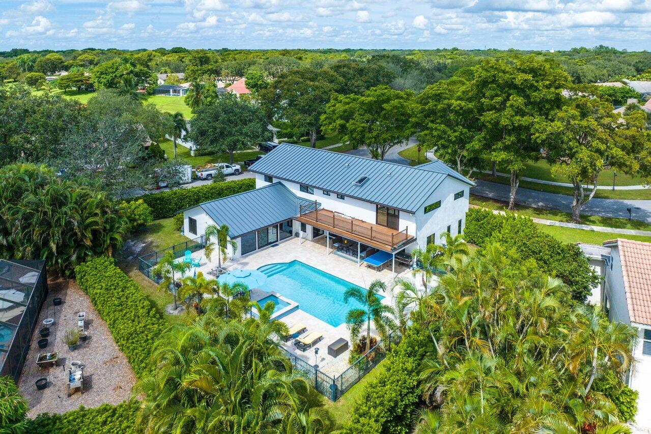 2296 Northwest 36th Street Boca Raton, FL 33431 - Photo 50 of 70 an aerial view of a house with garden space and street view