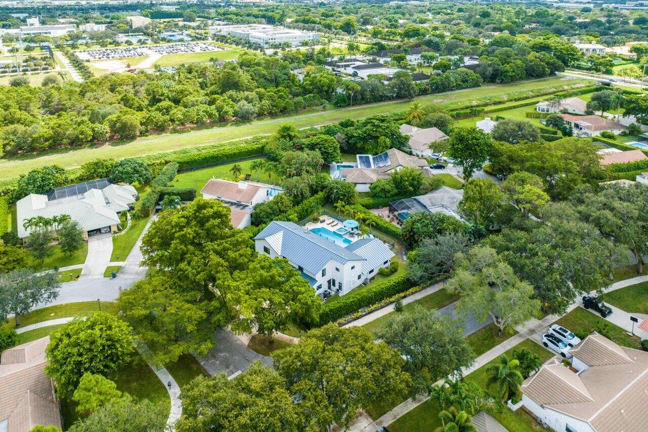2296 Northwest 36th Street Boca Raton, FL 33431 - Photo 54 of 70 an aerial view of residential houses with outdoor space and street view