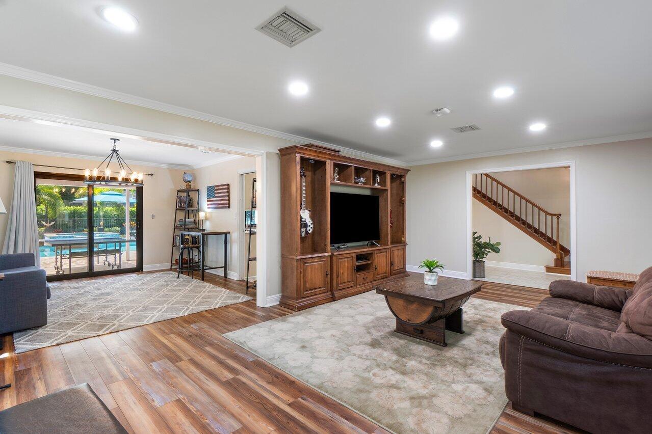 2296 Northwest 36th Street Boca Raton, FL 33431 - Photo 7 of 70 a living room with furniture and a flat screen tv