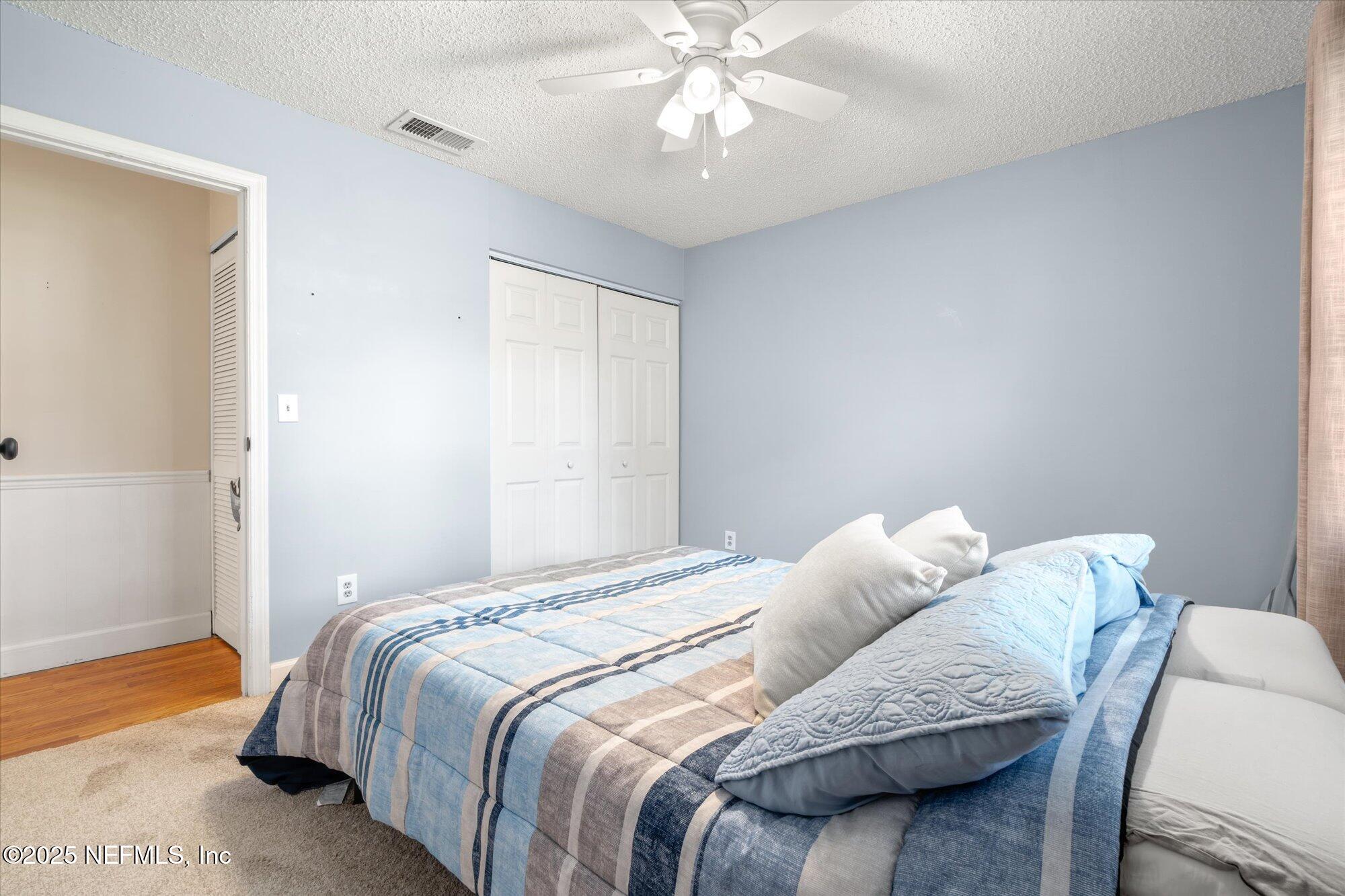 904 San Jose Road St. Augustine, FL 32086 - Photo 15 of 31 a bedroom with a bed and a window