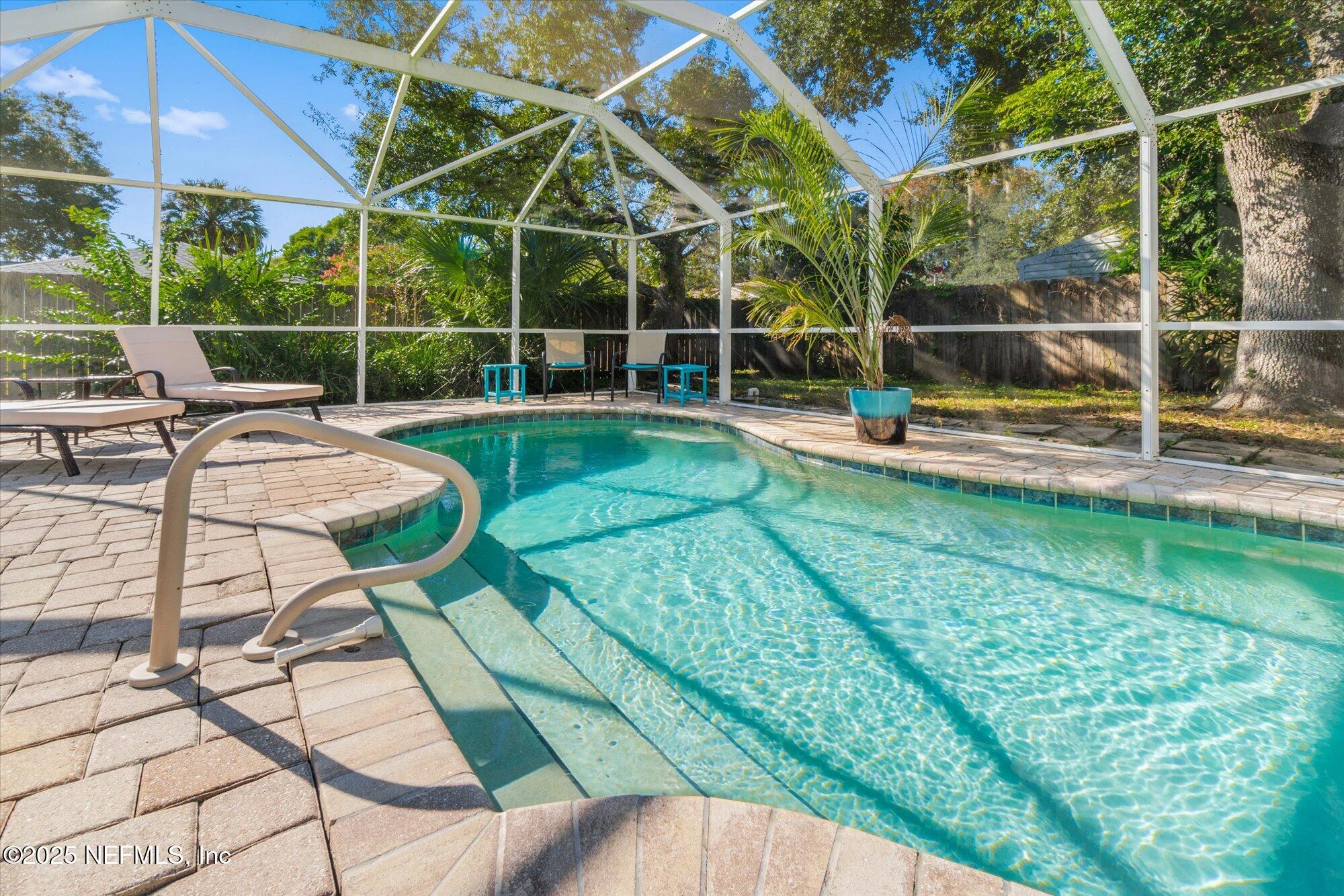 904 San Jose Road St. Augustine, FL 32086 - Photo 28 of 31 a view of a backyard with sitting area